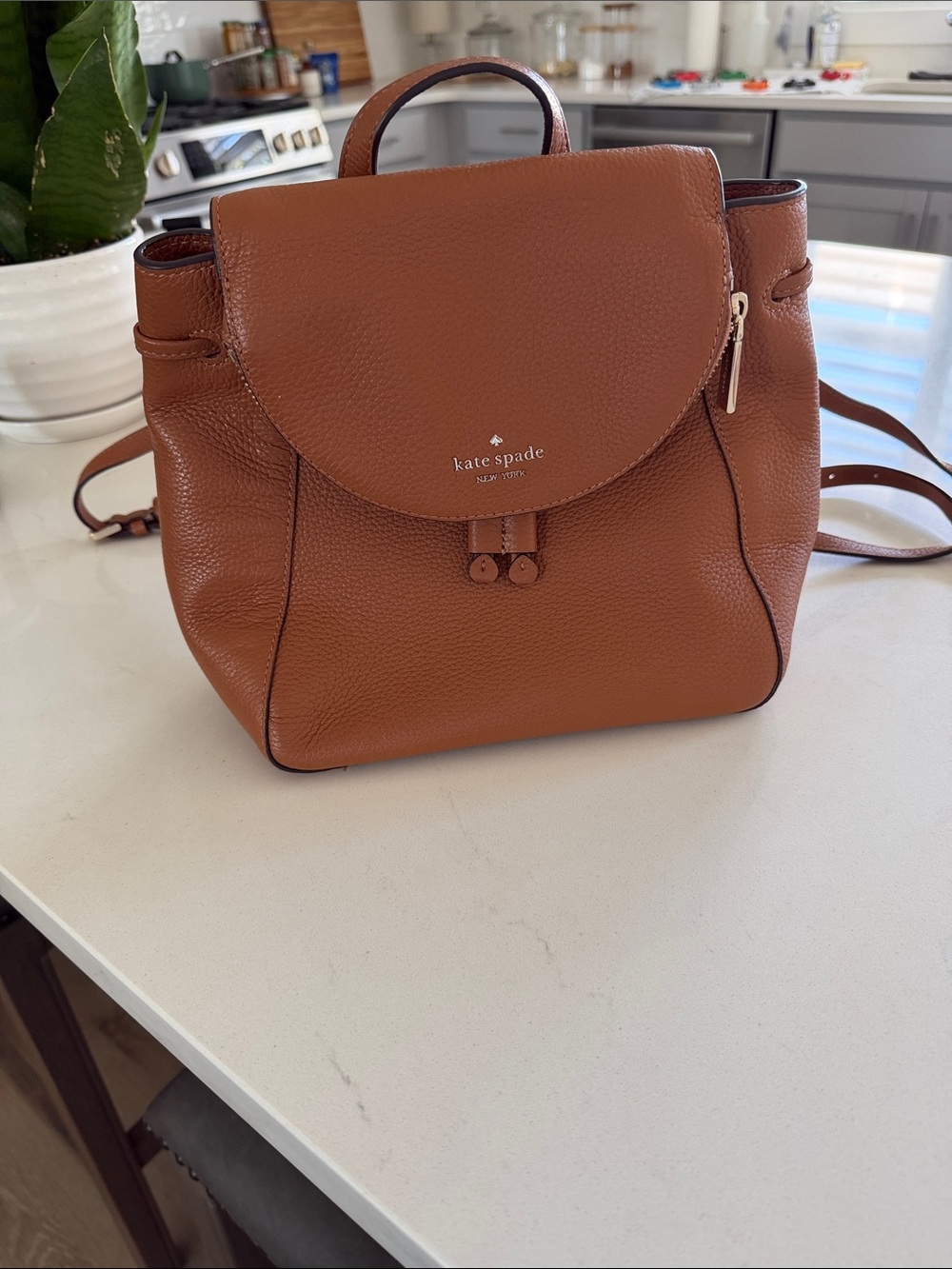 kate spade tan pebbled leather backpack